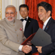 Narendra Modi shakes hands with Japanese Prime Minister Shinzo Abe in Tokyo in September 2014.